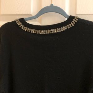 Black equipment sweater
